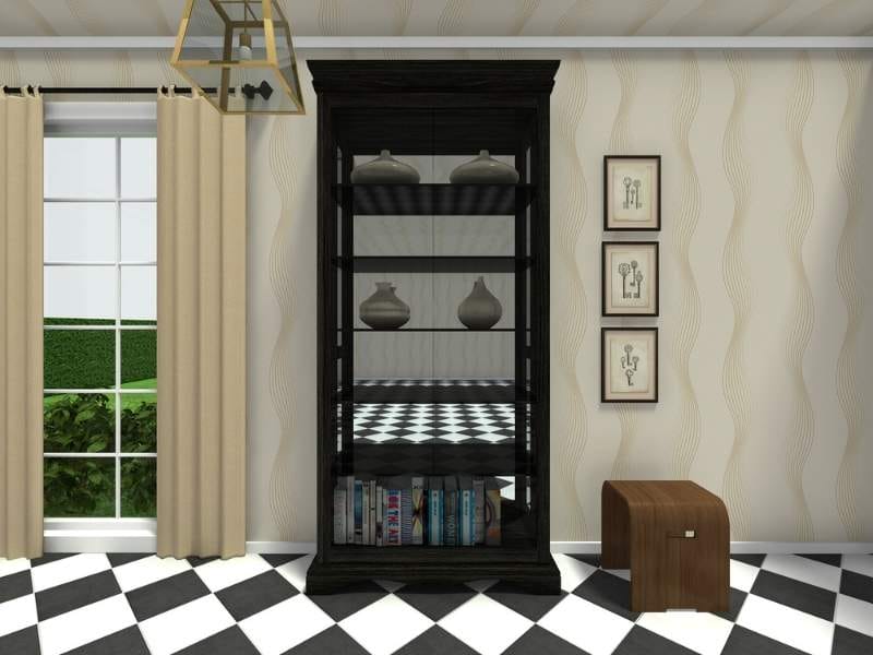 Black curio cabinet with decor inside