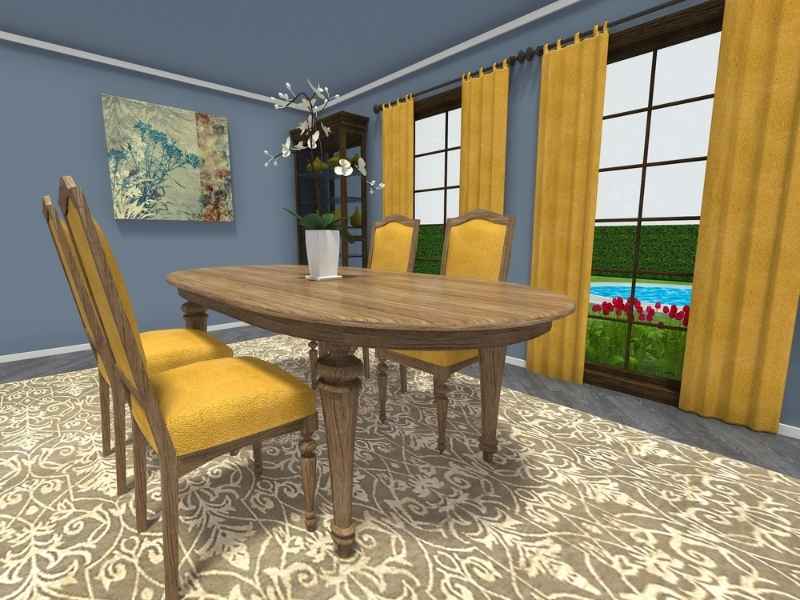 Dining room with a long wooden table and yellow chairs