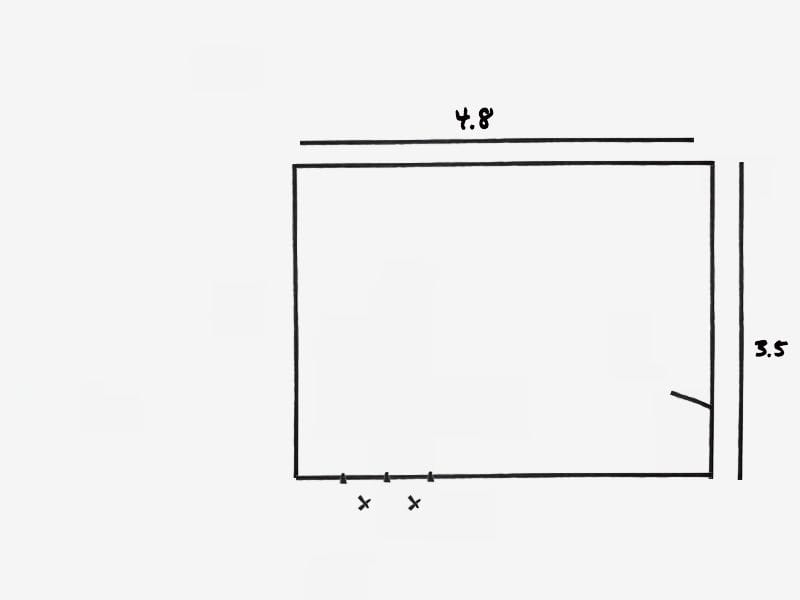 Hand drawn floor plan with measurements and windows