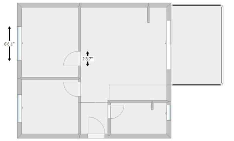 Floor plan displaying the length measurements of a door and a window.