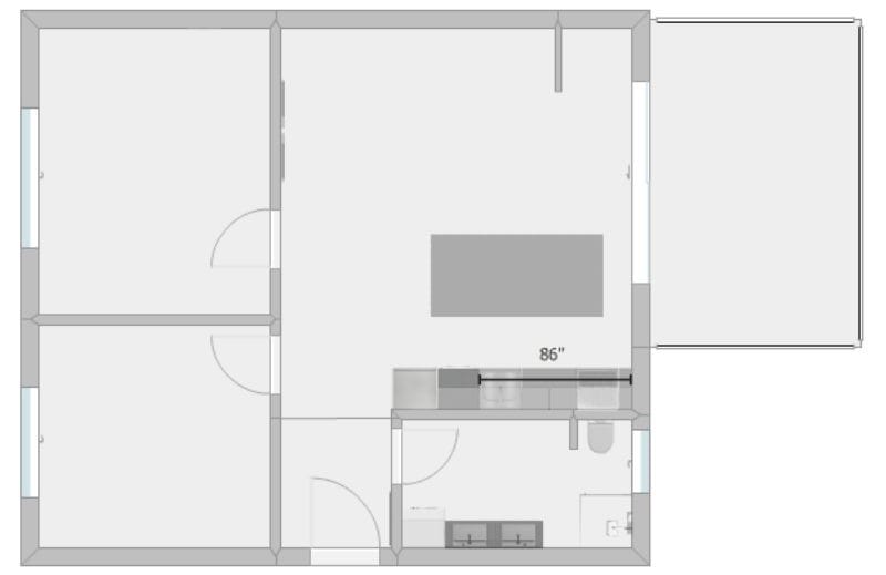 Floor plan displaying the total length measurements of kitchen cabinets.