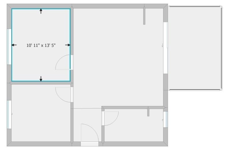 Floor plan depicting a room with labeled dimensions, illustrating the length and width measurements.